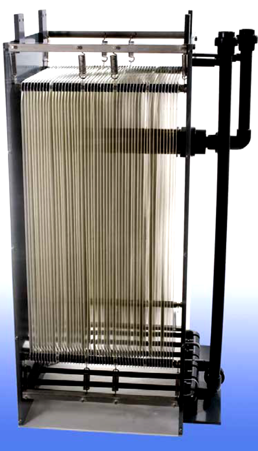 Microdyn Nadir BIOCEL module from 2005, with the permeate manifold running through the middle of the membrane sheets (visible near the top of the module)