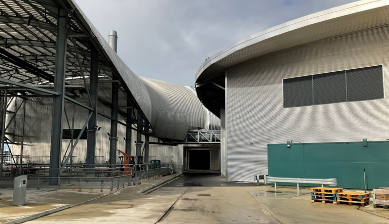 Inside Woolston WwTW: Primary treatment building in the background on the left, secondary treatment building on the right.