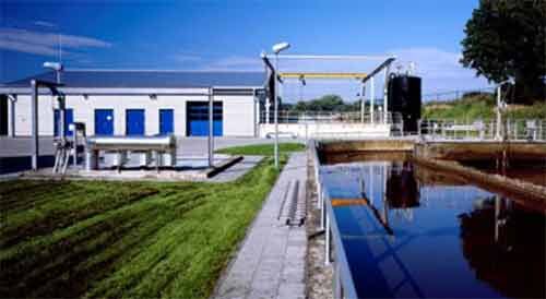 The retrofitted Glessen WWTP showing the membrane filtration facility in the background (Credit: Erftverband)