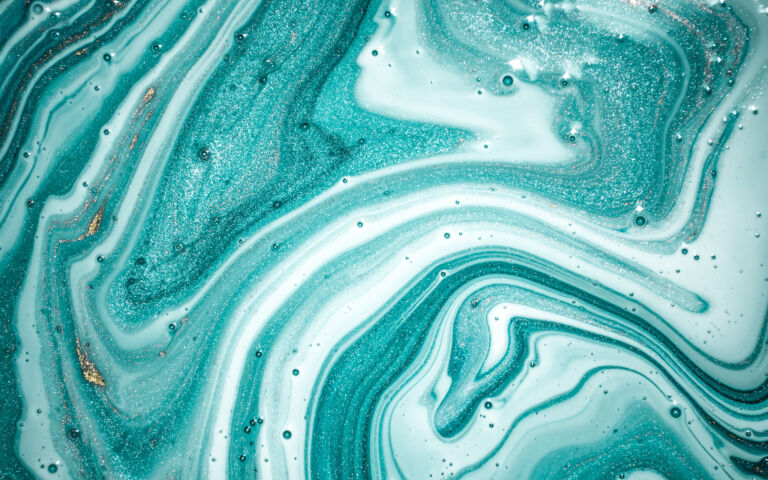 Abstract image of blue and white swirls of liquid