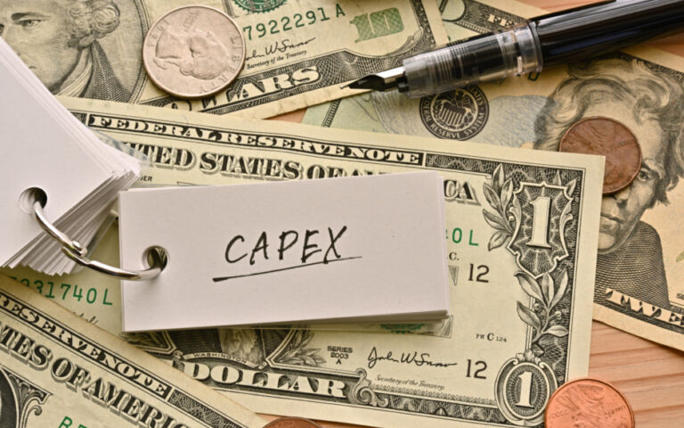 Dollar bills with note saying "CAPEX".