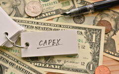 Dollar bills with note saying "CAPEX".