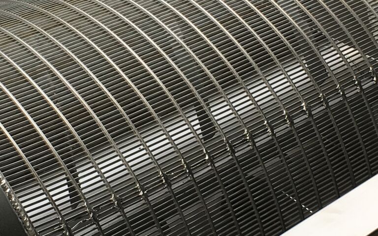 Rotary bar screen