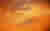 Abstract image of what looks like sand or flowing lava, in different shades of orange.